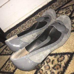 Gray swayed button strapped heel